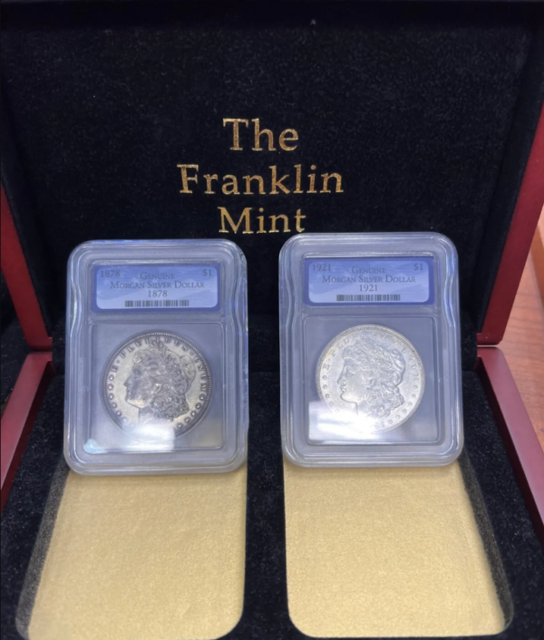 Franklin Mint Silver Morgan Dollar Set - Two authentic US silver coins featuring Lady Liberty and eagle designs, perfect for coin collectors.