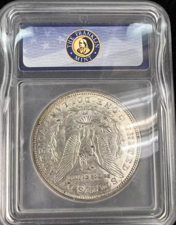 Franklin Mint Silver Morgan Dollar Set - Two authentic US silver coins featuring Lady Liberty and eagle designs, perfect for coin collectors.